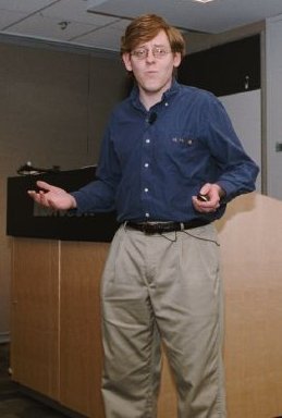 Photo of Alex asking a question Alex S. Brown Lecturing, Asking Question